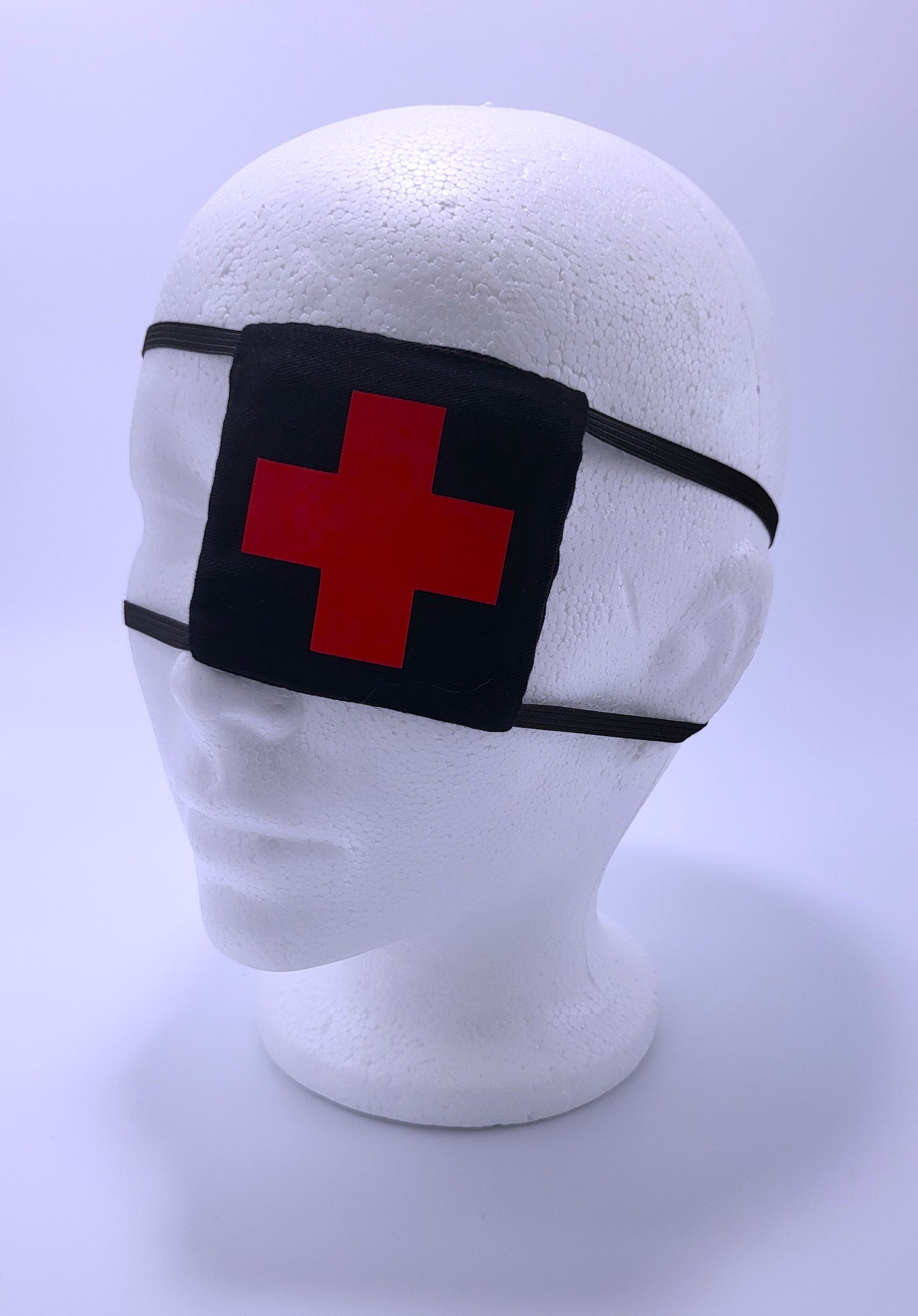 Black Square Medical Eyepatch With a Red Cross